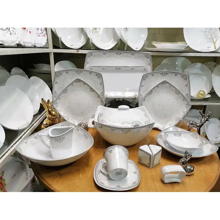 سرویس غذاخوری 12 نفره 105 پارچه چینی پردیس کاشان قالب پاریس طرح آزارا نقره ای 105 پارچه کد 2010A